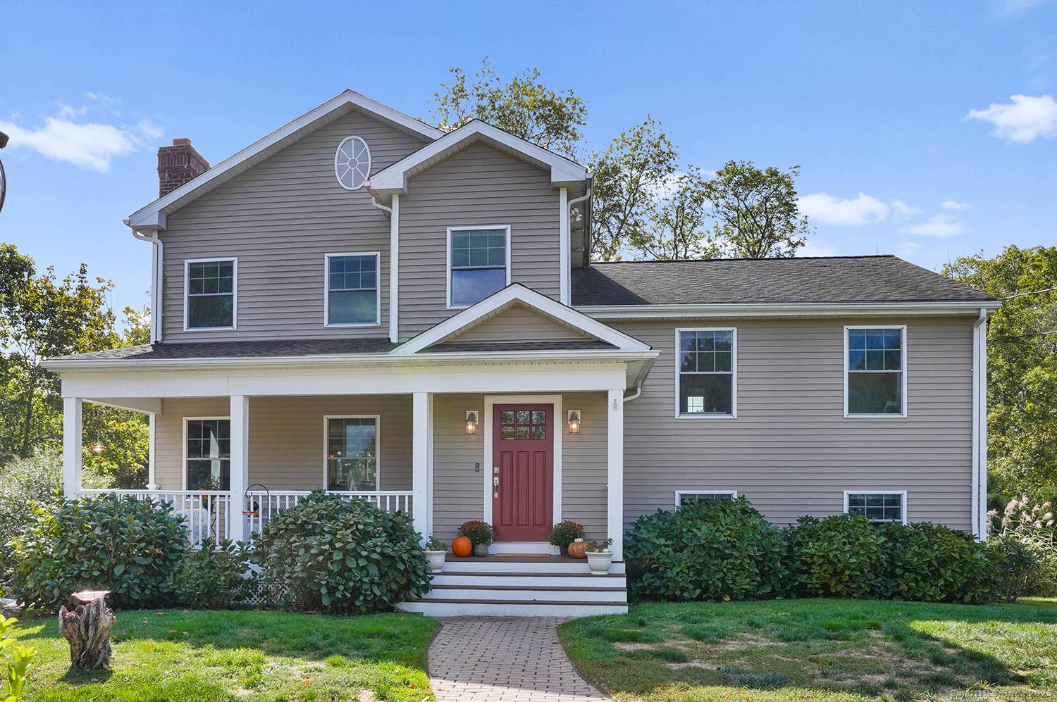 Filled with charm and curb appeal, this inviting 4 BR Colonial Split is perfectly sited on a quiet cul de sac just moments from Lake Mohegan's trails, playground, and beach.