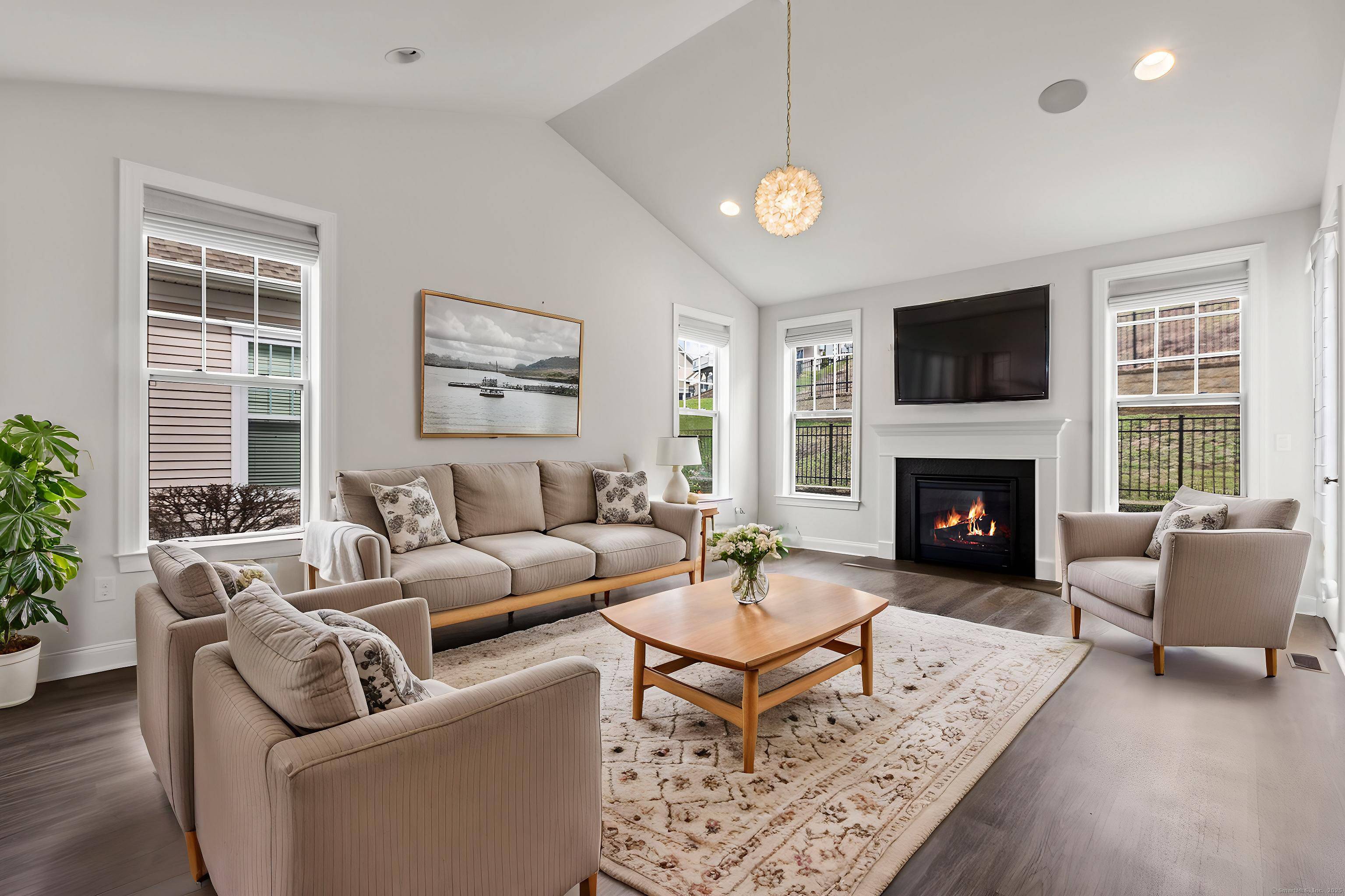 Built in 2022, this stunning home offers modern living with high ceilings, a first floor primary suite featuring dual walk in closets, and a beautifully finished basement.