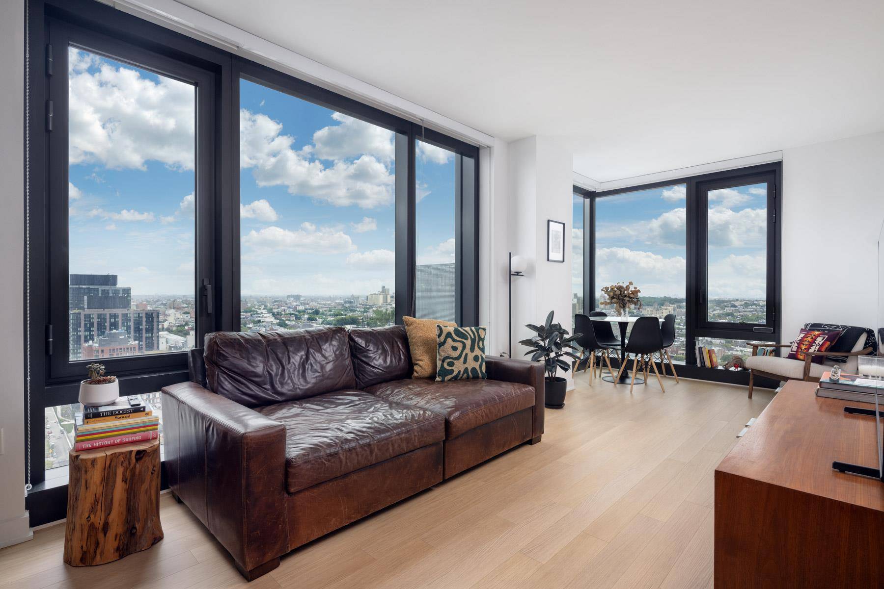 Sunny South East corner 1BR home with unobstructed views of Brooklyn and Queens from the floor to ceiling windows.