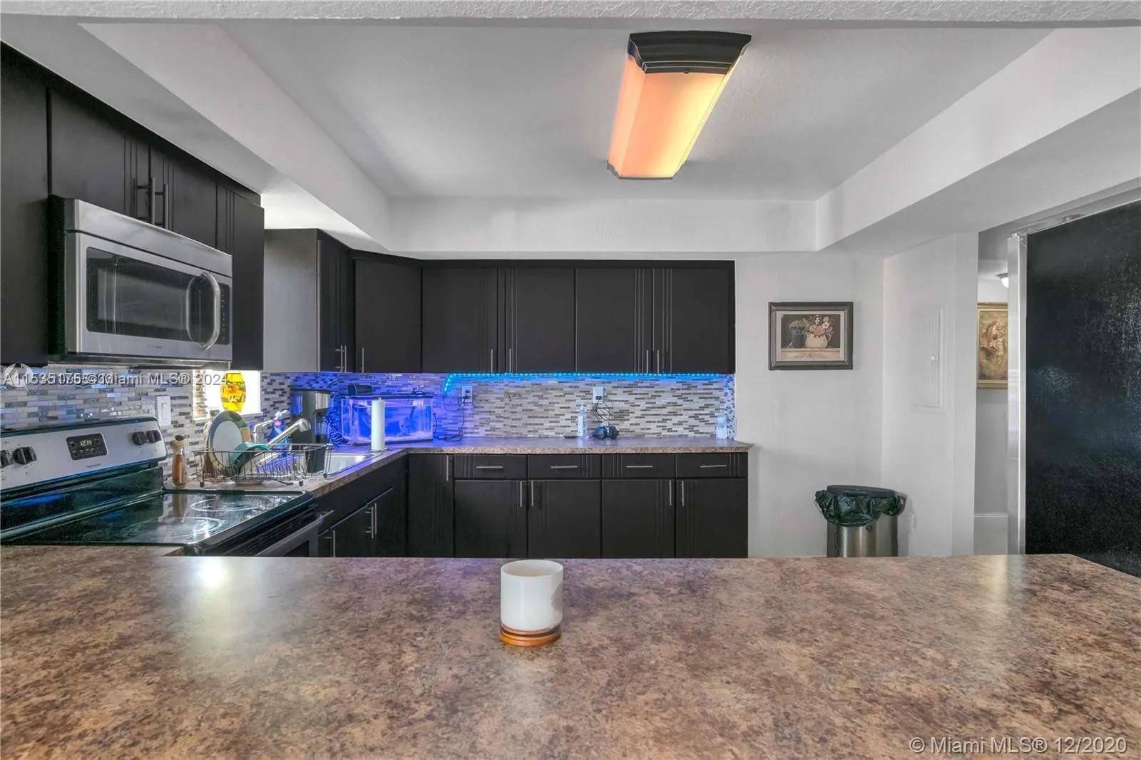 As you enter this cute corner condo which is located on the 2nd floor of the building.