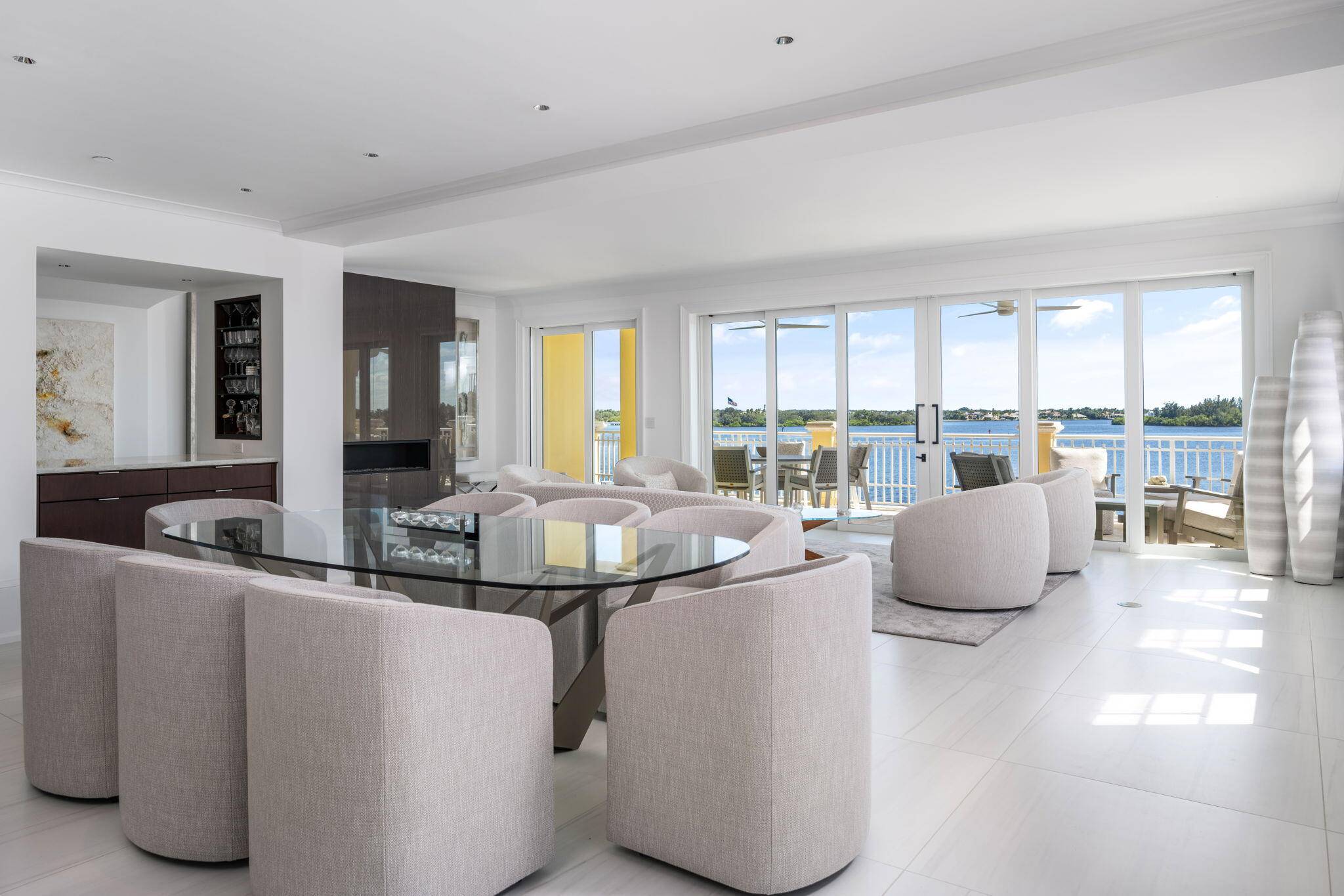 Indulge in the ultimate expression of coastal sophistication with this extraordinary 3, 500 sq ft penthouse overlooking the Intracoastal.