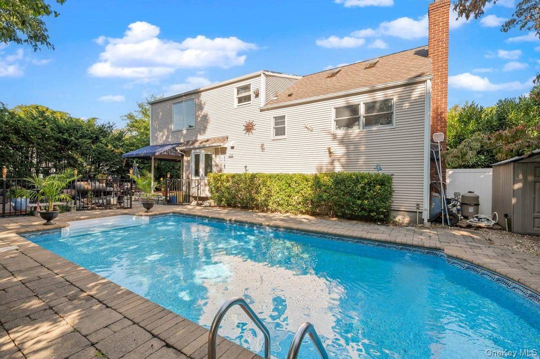 This is an excellent opportunity to own a beautiful home with a stunning backyard oasis featuring a pool, located in the award winning Jericho School District.