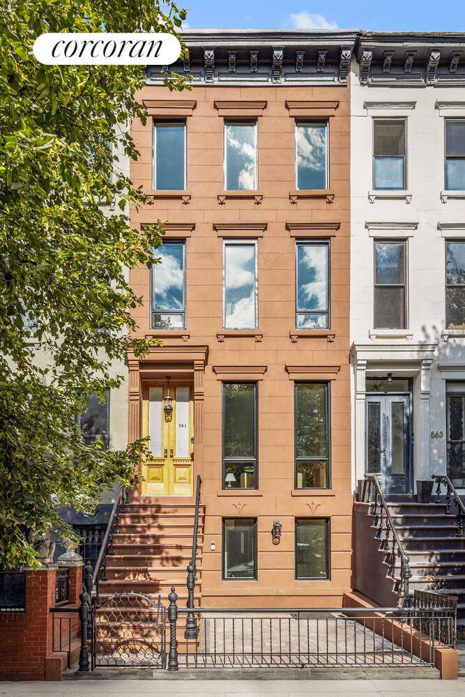 Hello, 561 Putnam ! A four story brownstone townhouse.