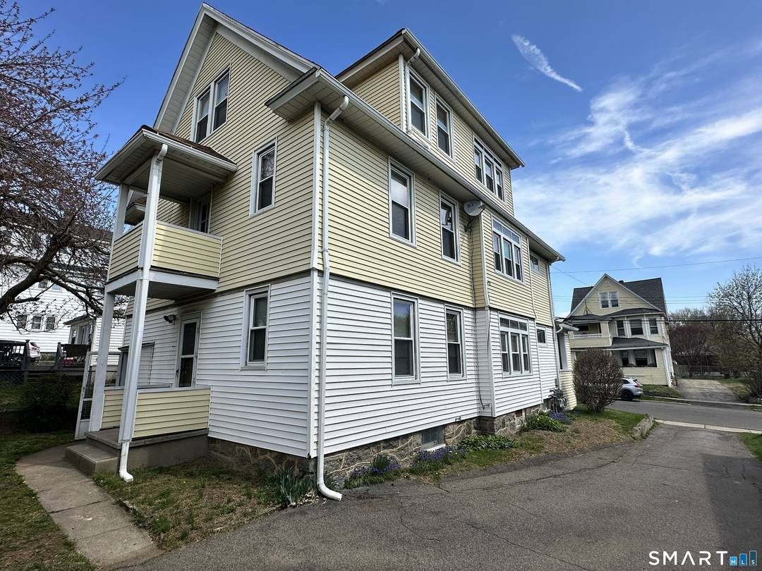 Rare 3 family investment opportunity in Stratford known as 255 257 259 Clover St.