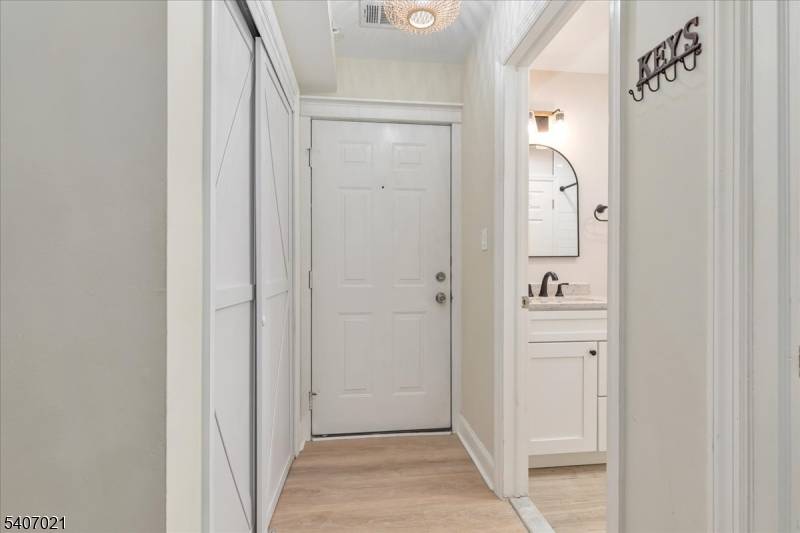 Bridgewater Move in ready 2 bedroom, 2 bath updated condo featuring an updated galley kitchen with granite countertops and stainless steel appliances.