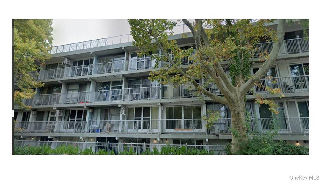 Shared driveway with neighboring Bayside post office.