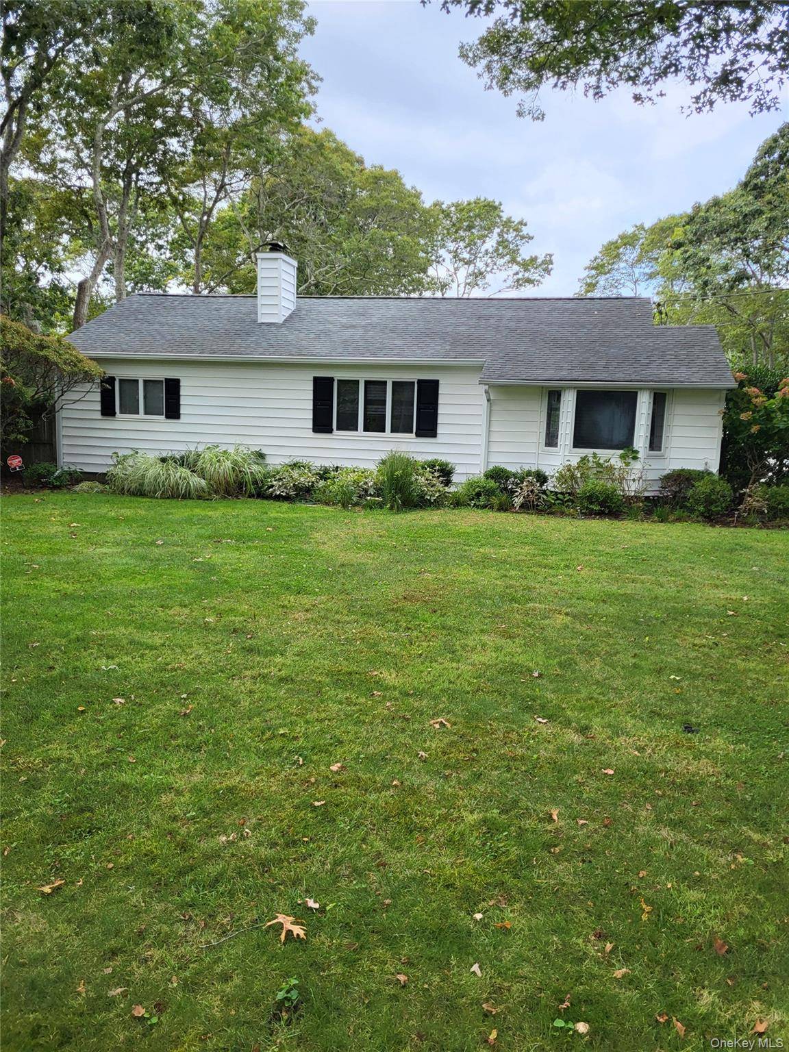 This quintessential hamptons retreat features 3 bdrooms and 2 baths, wood floors, and heated spa like pool.