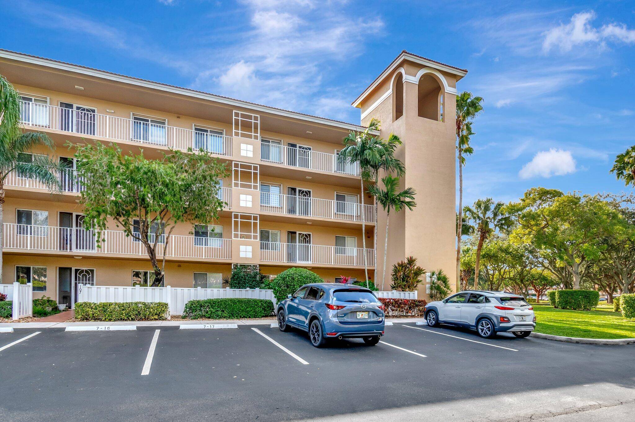 Spacious 3BR, 2BA penthouse with stunning lake views in a premier 55 resort style community.