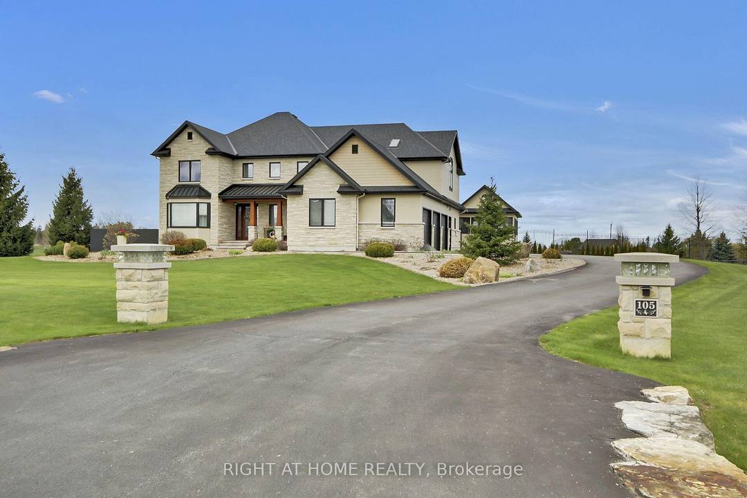 Welcome to this exceptional estate set on two beautifully landscaped acres, offering a rare blend of luxury, space, and thoughtful design.