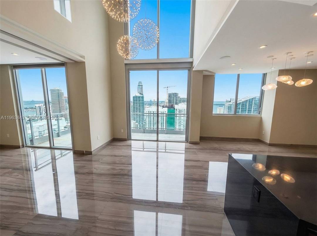 Penthouse 5213 at The Mint Condominium offers a truly rare opportunity to own a 52nd floor residence with a private rooftop deck an exceptionally uncommon feature at this elevation.
