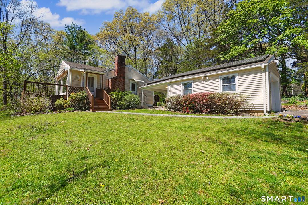 Tucked away on a private drive just moments from the Wilton border, this inviting 3 bedroom 2 bath home offers a rare blend of convenience and quiet retreat.
