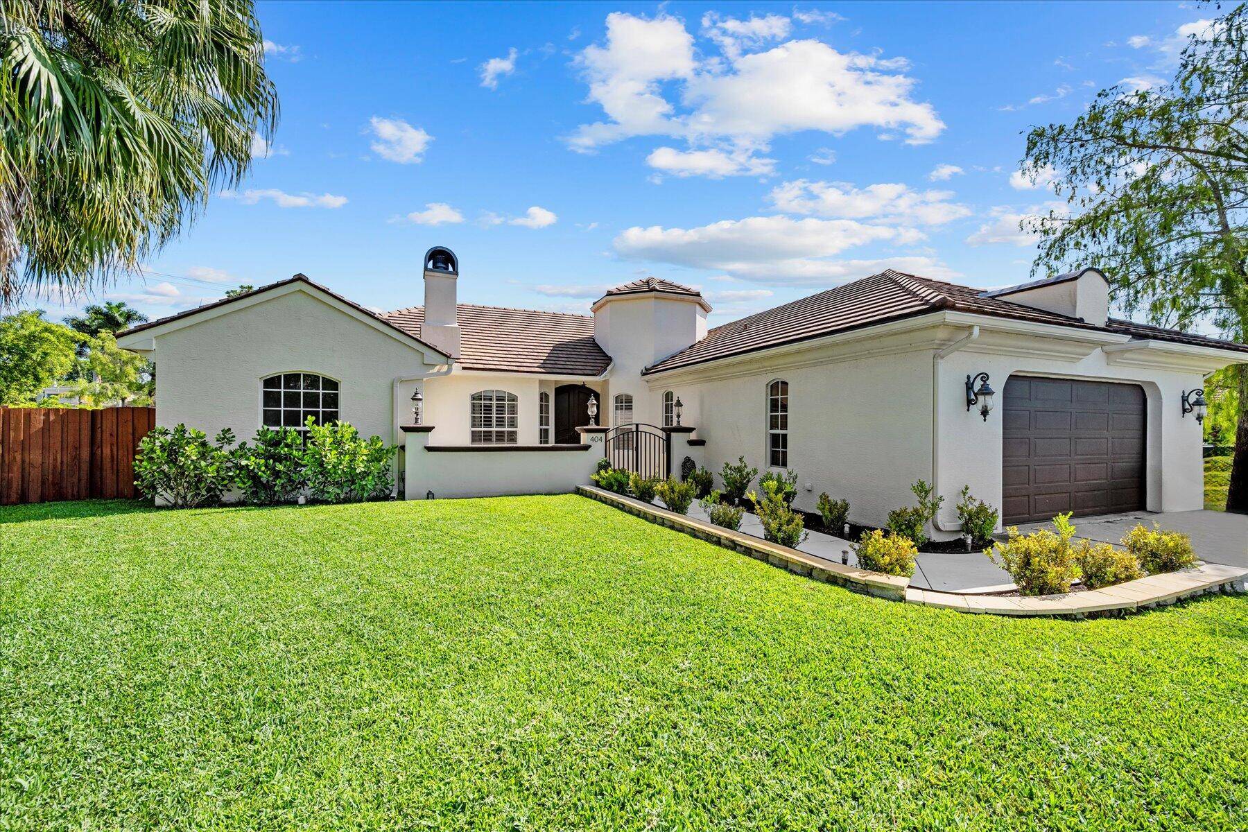 This beautifully updated fully furnished and turn key 4 bedroom 3 bath home in the heart of Wellington boasts a luxurious primary suite, a contemporary kitchen, and an outdoor oasis ...
