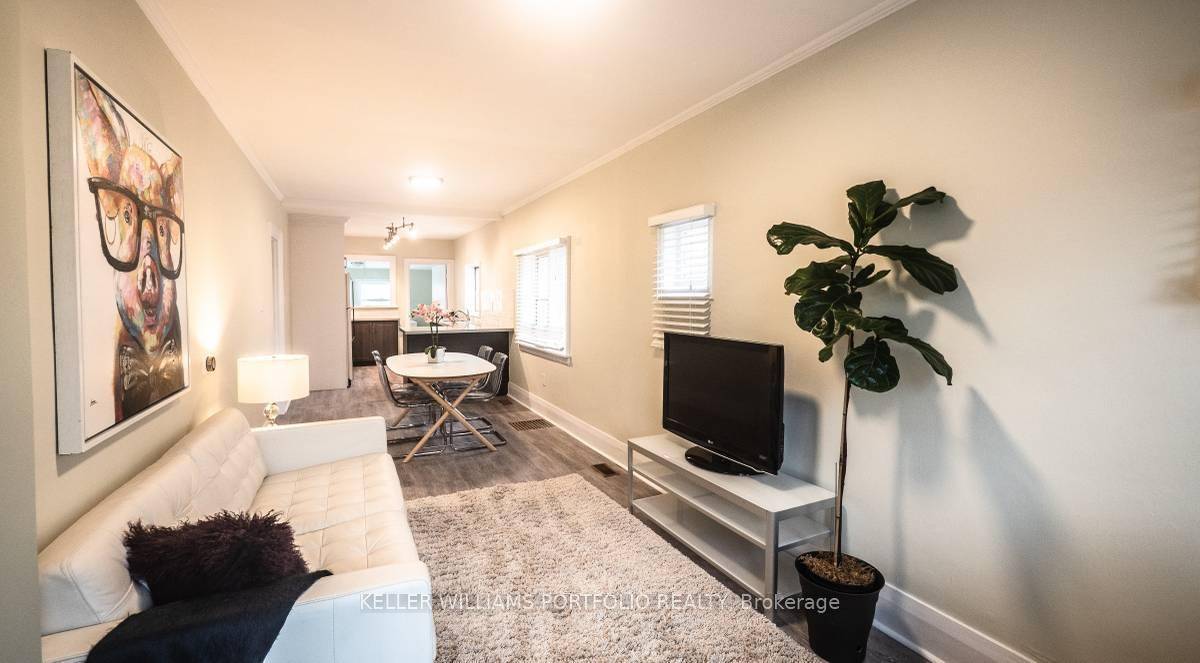 Huge, recently renovated, and beautiful open concept two bedroom first floor apartment, with front door entrance and rear access to the backyard, with available parking !