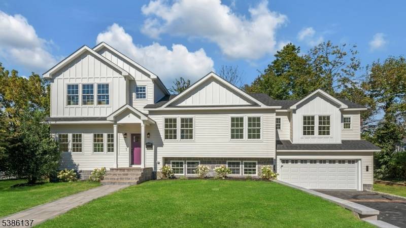 Welcome to this stunning newly constructed 5 bedroom, 4 bathroom residence nestled in the desirable heart of Summit, New Jersey.