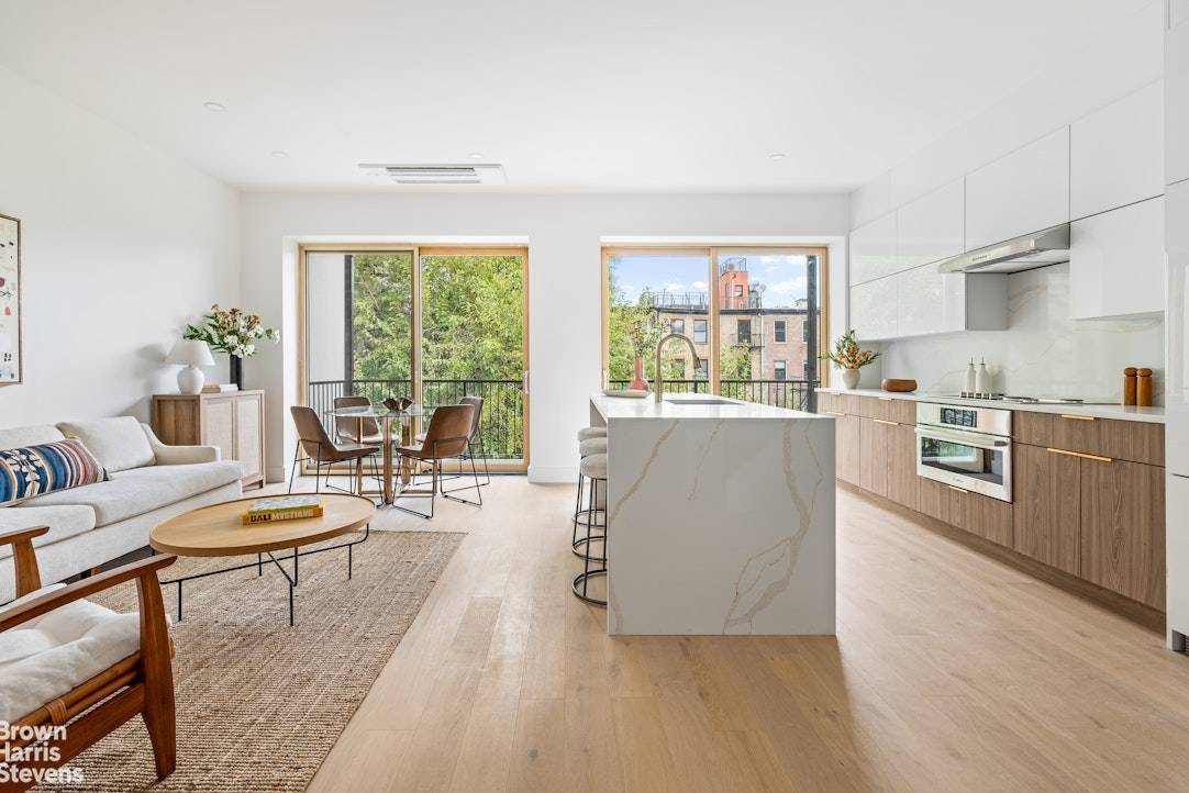 Discover unparalleled luxury at 323 South 5th Street in this elegant 2 bedroom, 2 bathroom duplex condo with an additional 510 sq ft.