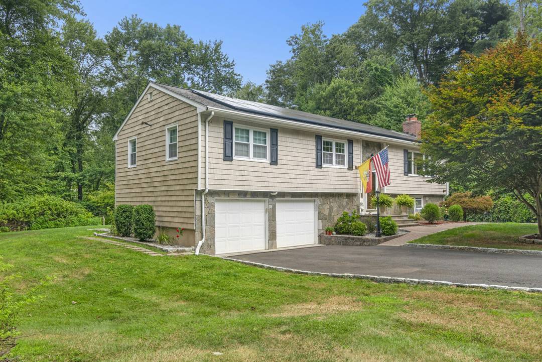 Welcome to this beautifully updated and impeccably maintained Raised Ranch, offering 6 spacious rooms, including 4 bedrooms and 3 modernized baths.