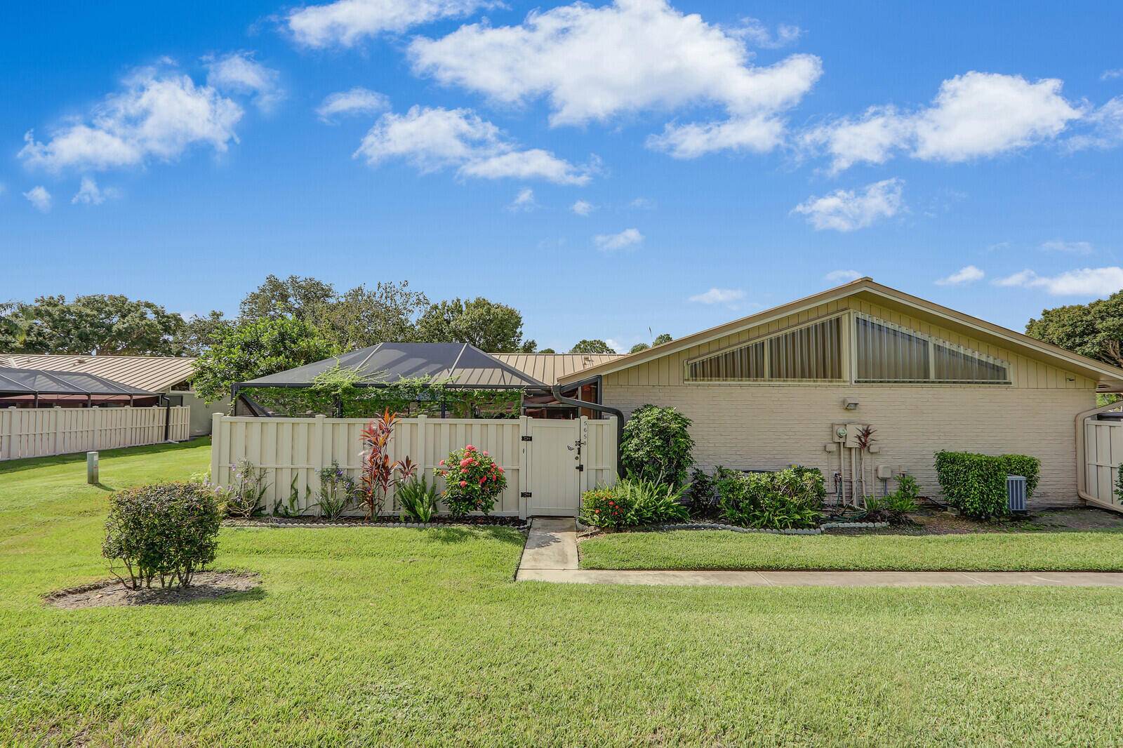 Welcome to 5658 Golden Eagle Circle, a beautifully updated 3 bedroom townhome in the desirable Westwood Gardens of Palm Beach Gardens.
