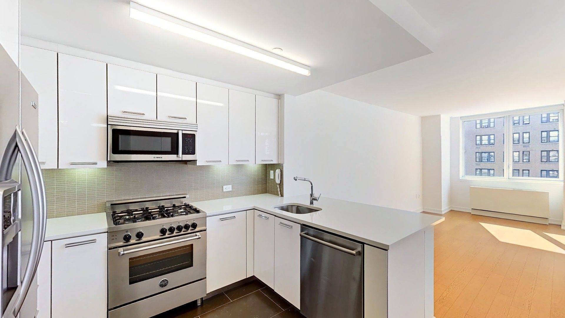 Corner 1 bedroom with great open views down Broadway.