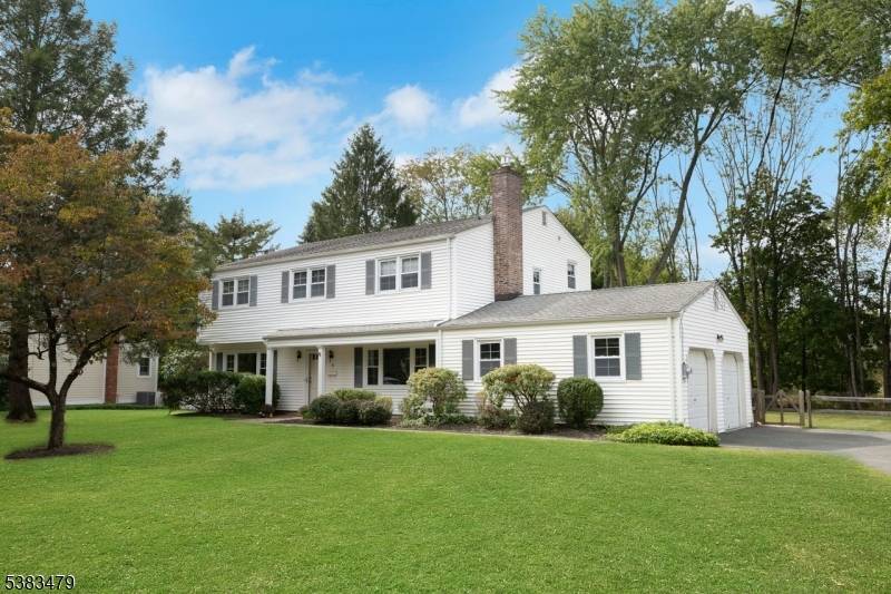 Updated 10 room colonial split featuring 4 bedrooms and 2.