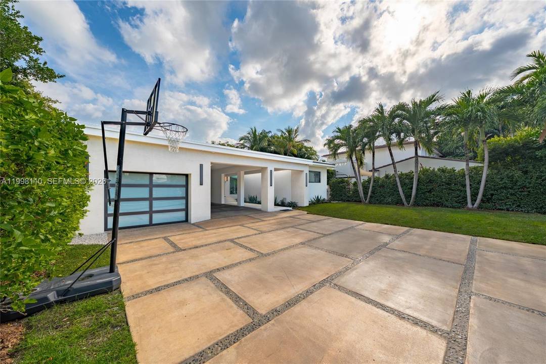 Located on prestigious Lower North Bay Road, this gated Miami Beach home sits on an oversized 10, 500 SF lot vs typical 7, 000 SF, offering a rare combination of ...