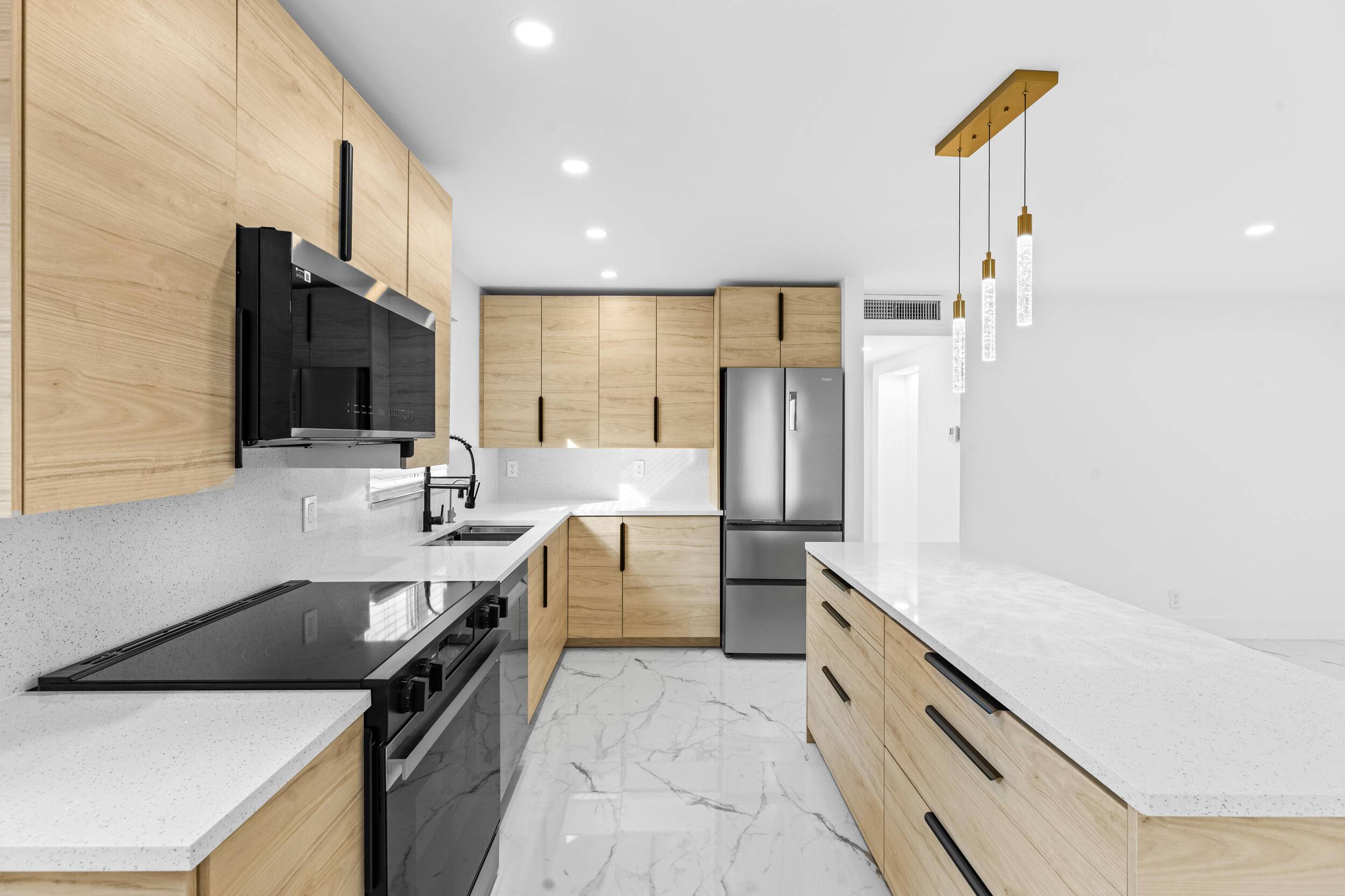 Completely renovated first floor 2 Bed 2 Bath with all new impact windows and front door, new AC, new custom kitchen with quartz countertops, new top of the line stainless ...