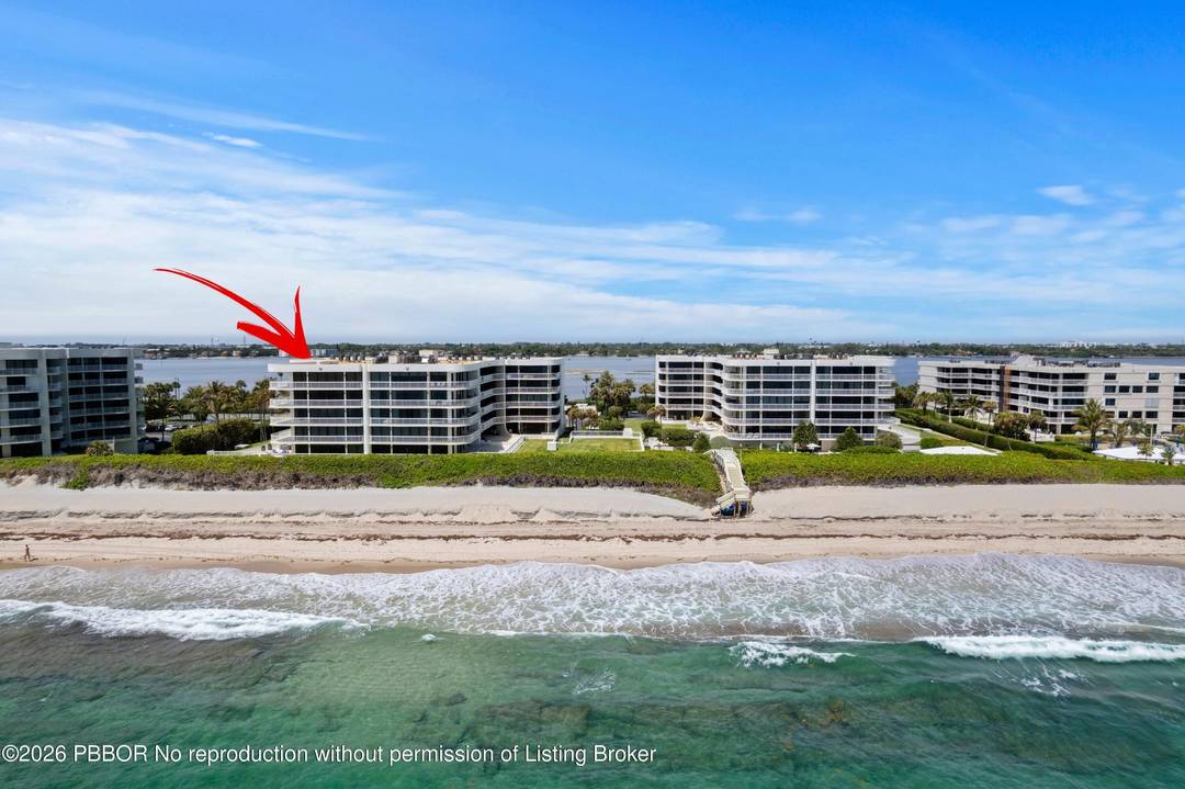 Enjoy sweeping ocean, beach amp ; pool views from this expansive top floor residence in the Meridian of Palm Beach.
