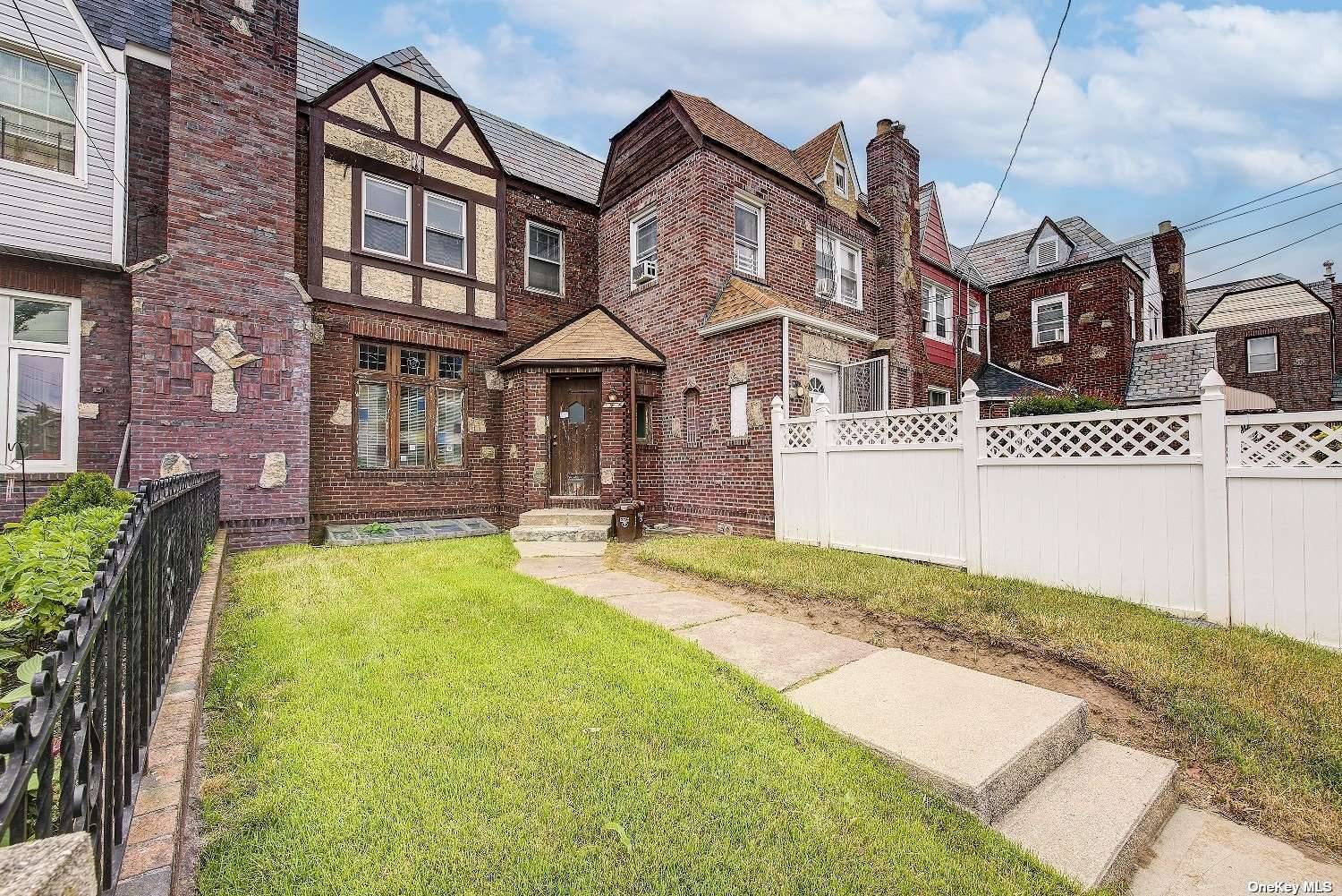 Brick construction 2 family Tudor style home in highly sought after South Ozone Park, Queens.