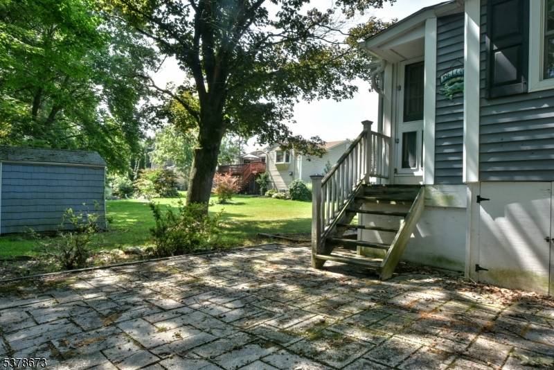 Lovely and rare, this ranch home features, 3 bedrooms, hardwood floors throughout, beautiful knotty pine beamed ceiling and 1 bathroom.