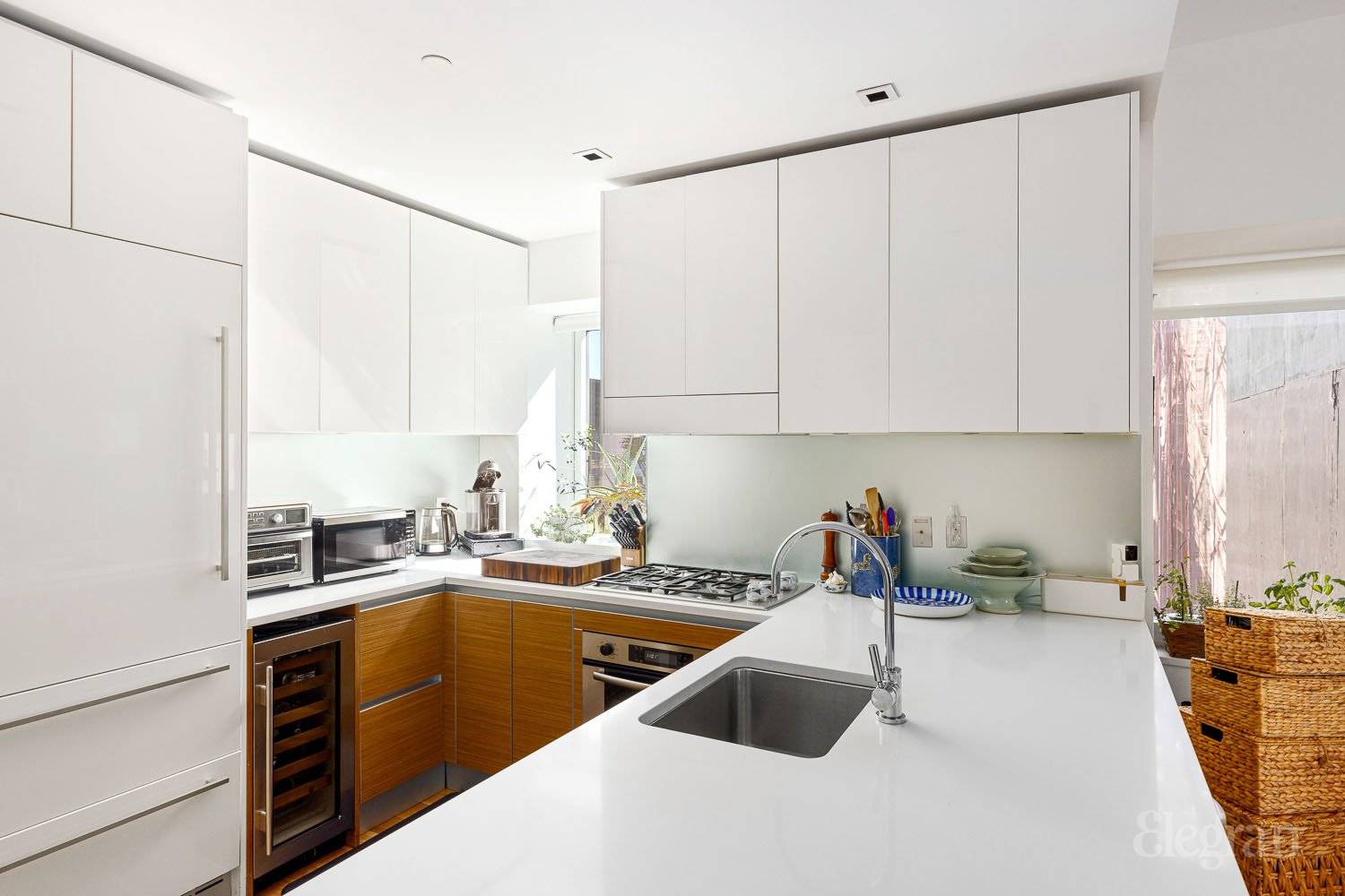 Experience the epitome of luxury living in this expansive two bedroom, two bathroom residence at the prestigious Element Condominium.