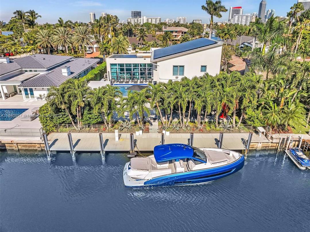 Experience the ultimate waterfront lifestyle in this contemporary estate in the guard gated Golden Isles.