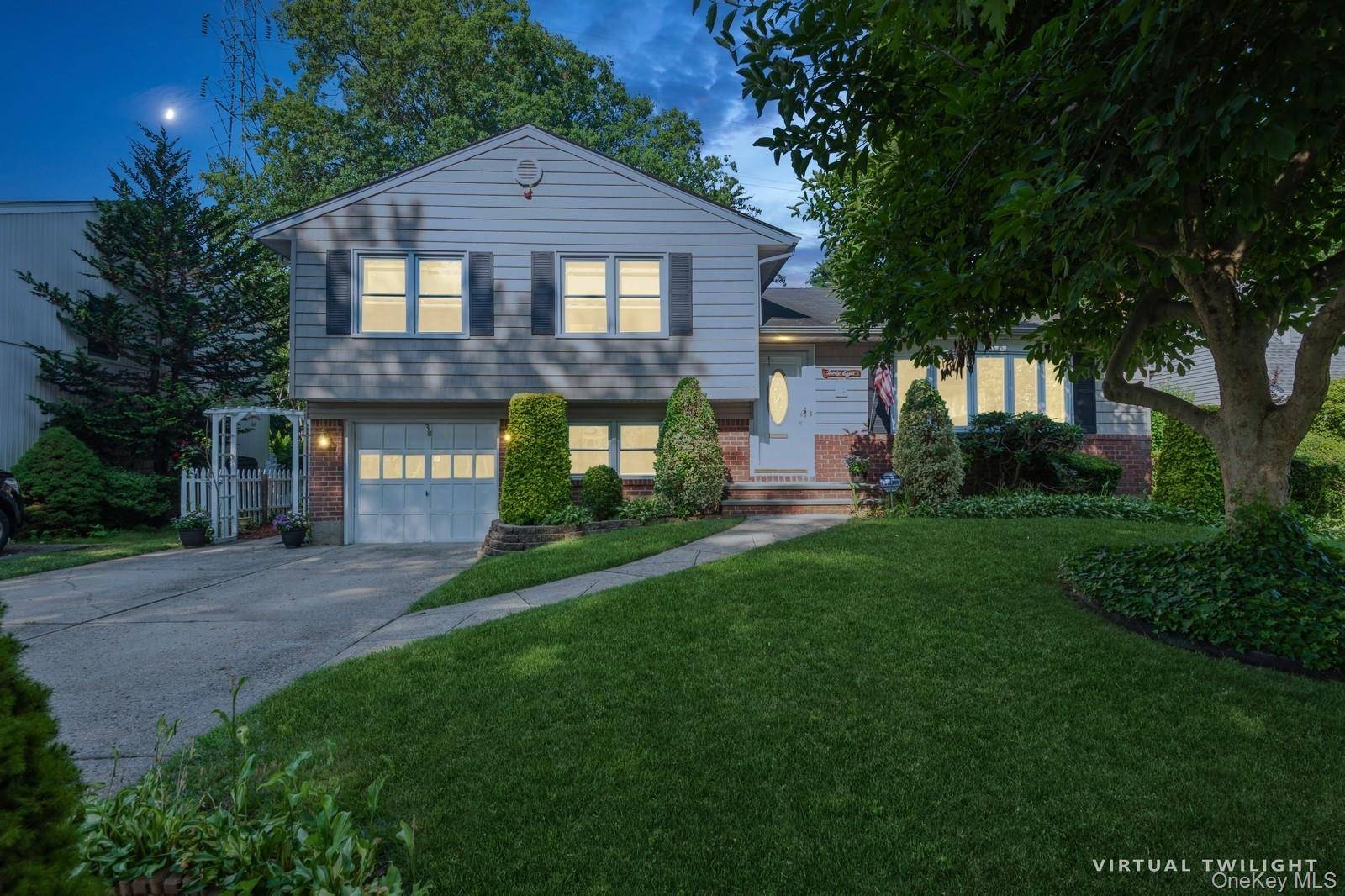 Nestled on an impeccably groomed 60 x 125 lot, with an additional 60 x 25 adjoining parcel, this lovely 3 bedroom split level residence exudes timeless elegance and boundless potential.