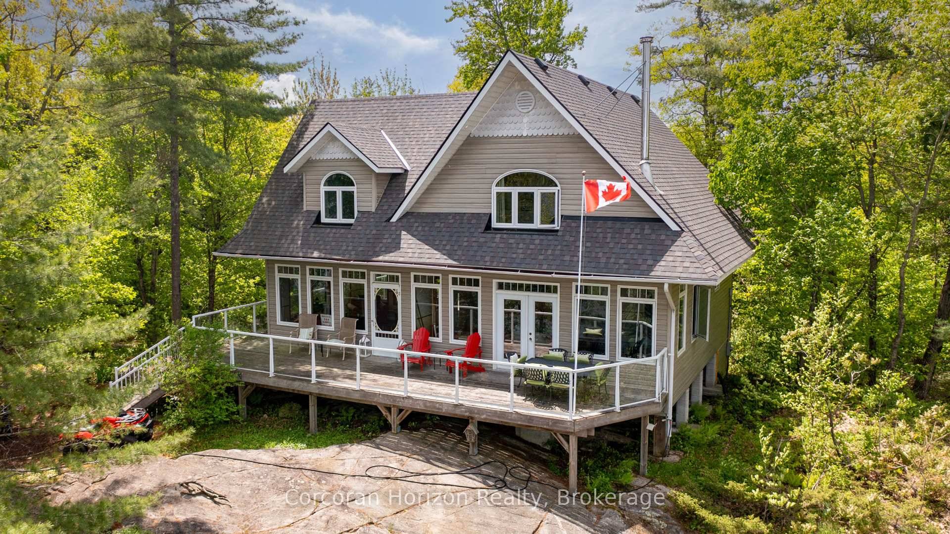 Welcome to your slice of Muskoka paradise this turn key, 3 bedroom cottage on Six Mile Lakes Hungry Island blends classic charm with modern comfort in an unforgettable, private setting.