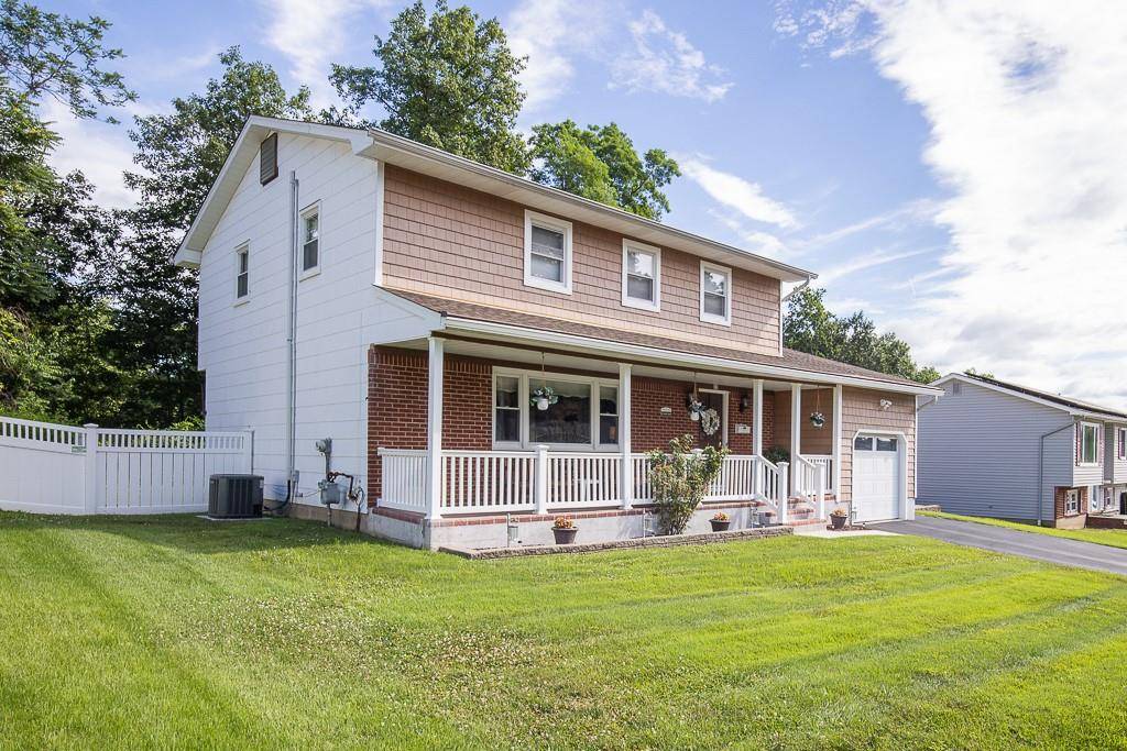 Charming Colonial With Front Porch !