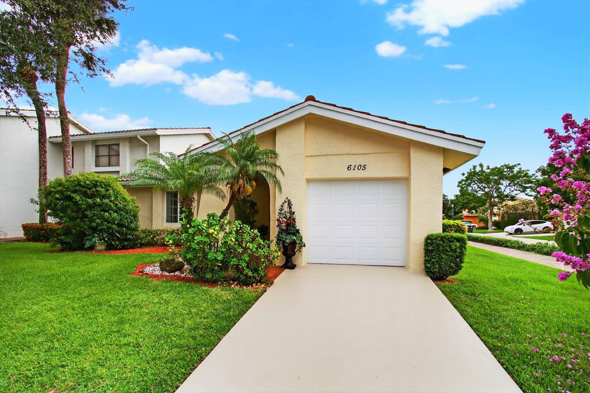 LOCATION ! LOCATION ! DISCOVER THIS RARE 3 2 GARAGE SUNLIT CORNER VILLA IN GATED ESTADA.