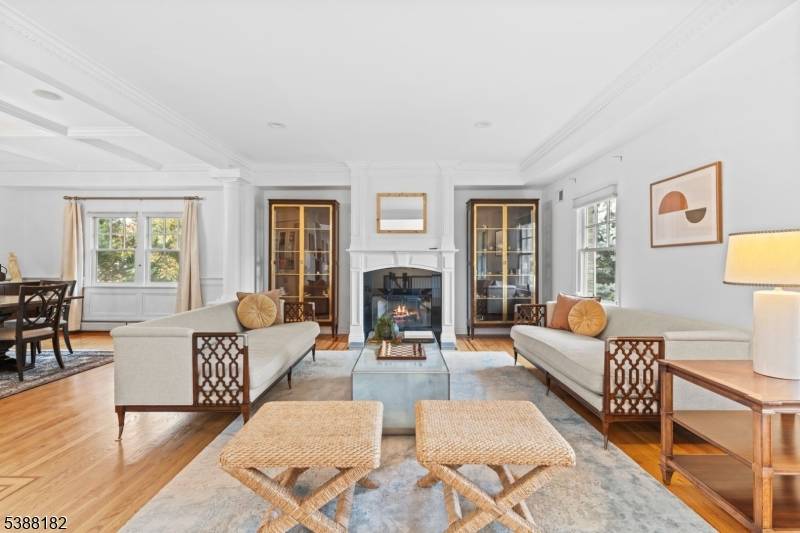 A HOME OF SCALE AND REFINEMENT, where soaring ceilings, abundant natural light, a gourmet kitchen with center island, and refined Details create a residence that is as functional as it ...