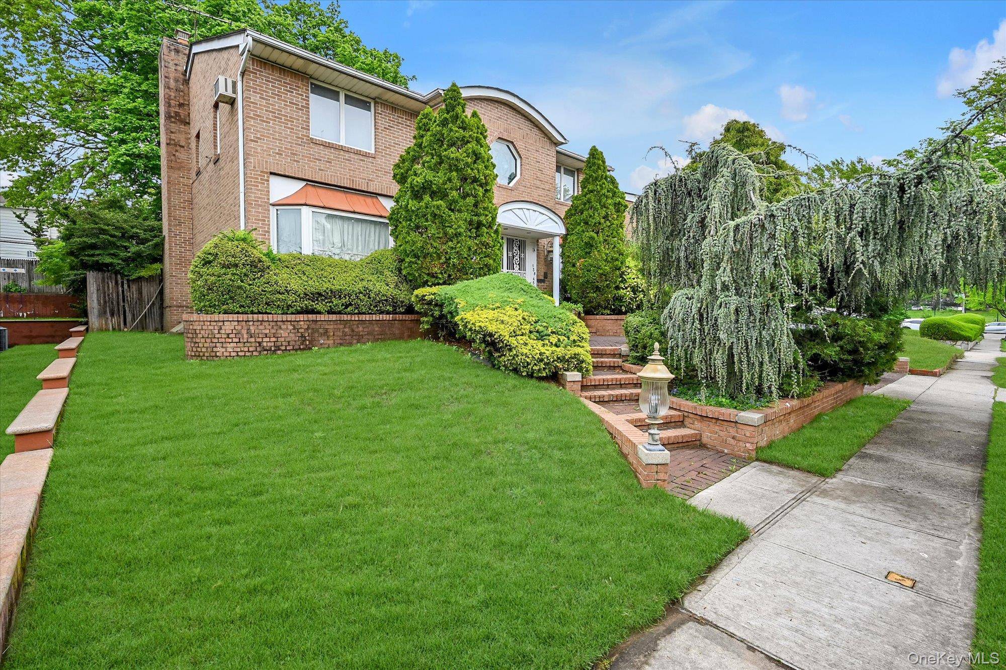 A Rare Offering in Kew Gardens Hills Welcome to this magnificent 60x100 Center Hall Colonial, set on one of the most coveted blocks in Kew Gardens Hills.