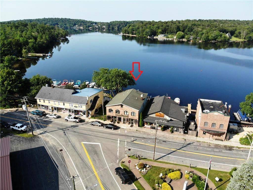 Beautifully renovated commercial building is located right on Restaurant Row with fabulous frontage on desirable Kauneonga Lake in the Town of Bethel.