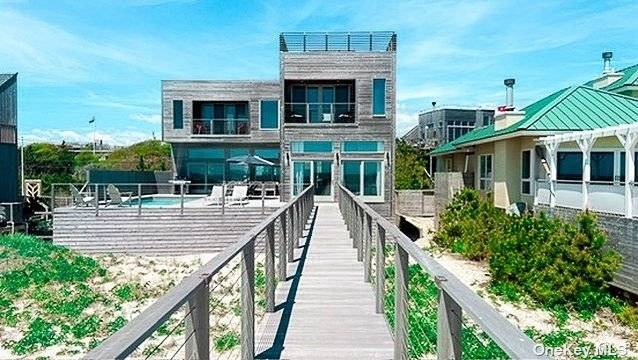 418 Ocean Walk is an architect designed oceanfront home built to current building and elevation codes from the ground up in 2016.