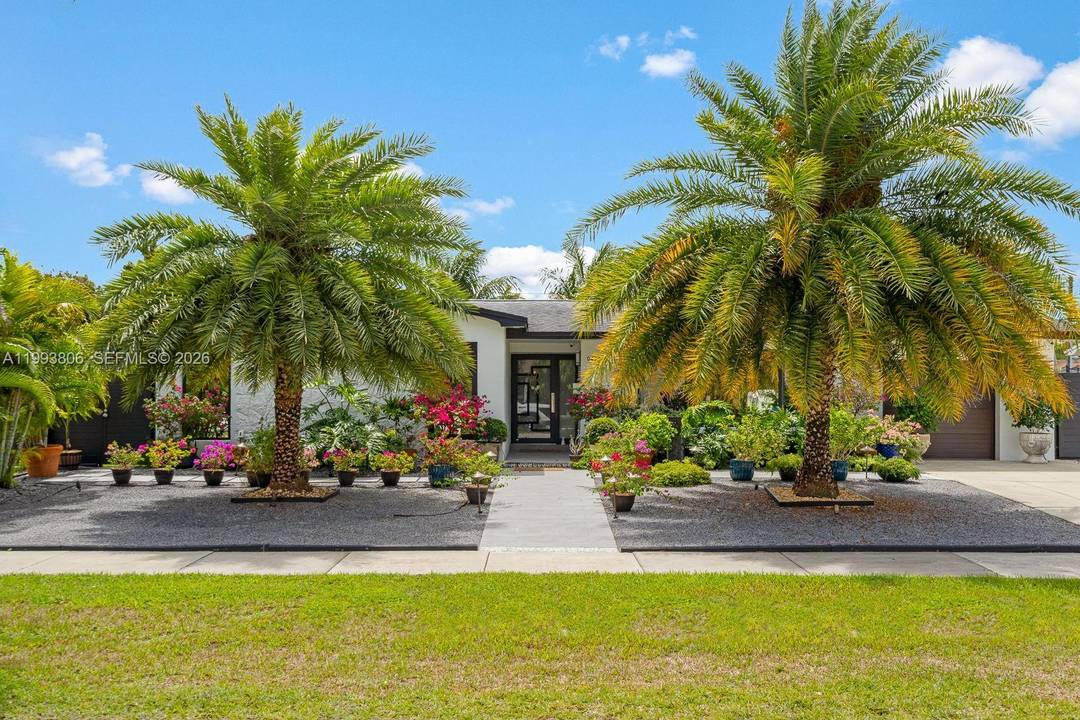 Located in the highly sought after Whispering Pines neighborhood in Cutler Bay, this beautifully remodeled home offers a perfect blend of style and functionality.
