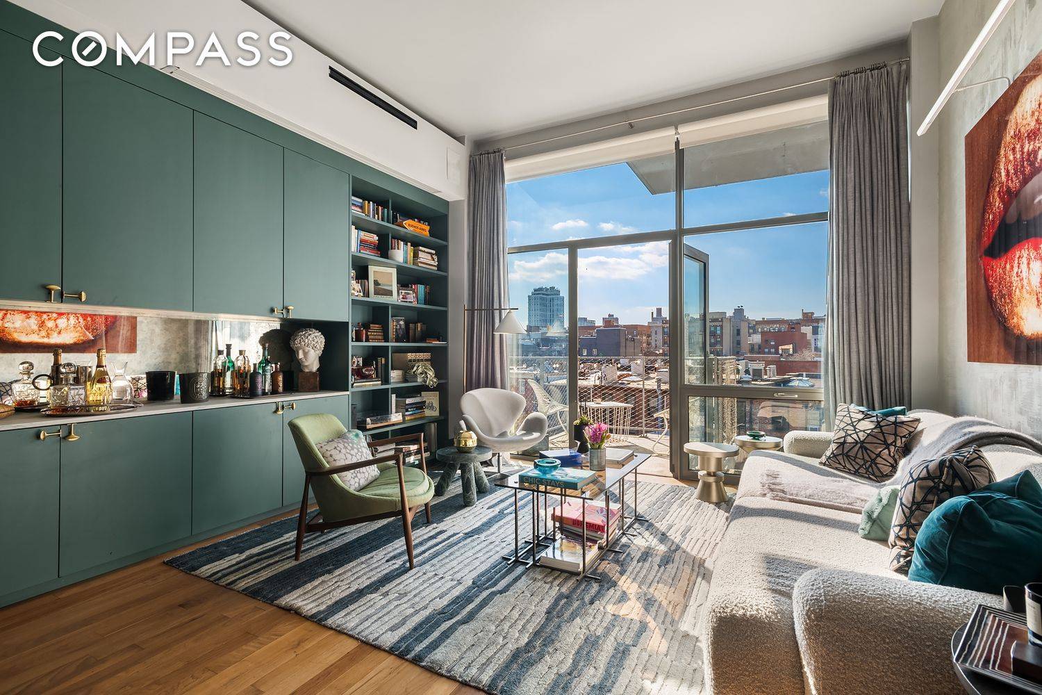 STUNNING DESIGNER UPGRADED 3 BEDROOM CONDO WITH A PRIVATE BALCONY OFF THE LIVING ROOM DEEDED STORAGE UNIT ROOFTOP CABANA WITH WEBER GAS GRILL.