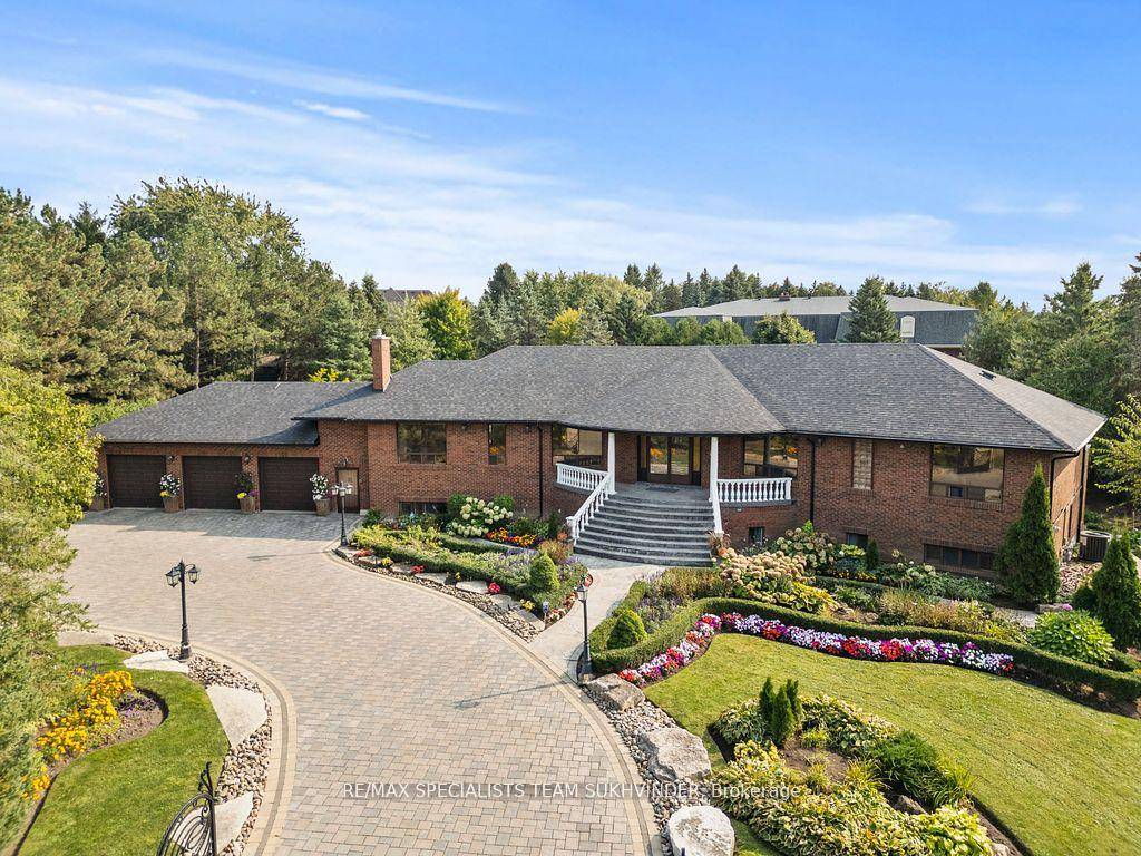 Welcome to 109 Collard Drive, a rare opportunity to own a custom raised bungalow on over 2 acres of meticulously landscaped grounds with more than 400 feet of frontage in ...