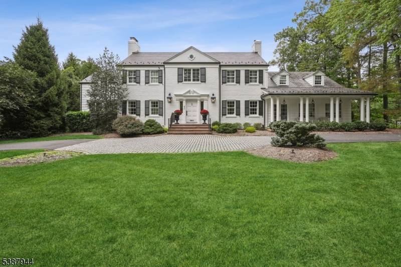 STUNNING STATELY PRIME OLD SHORT HILLS LOCATION Set atop over an acre of beautifully landscaped property, this spectacular 1936 Colonial was completely gut renovated and expanded to perfection creating an ...