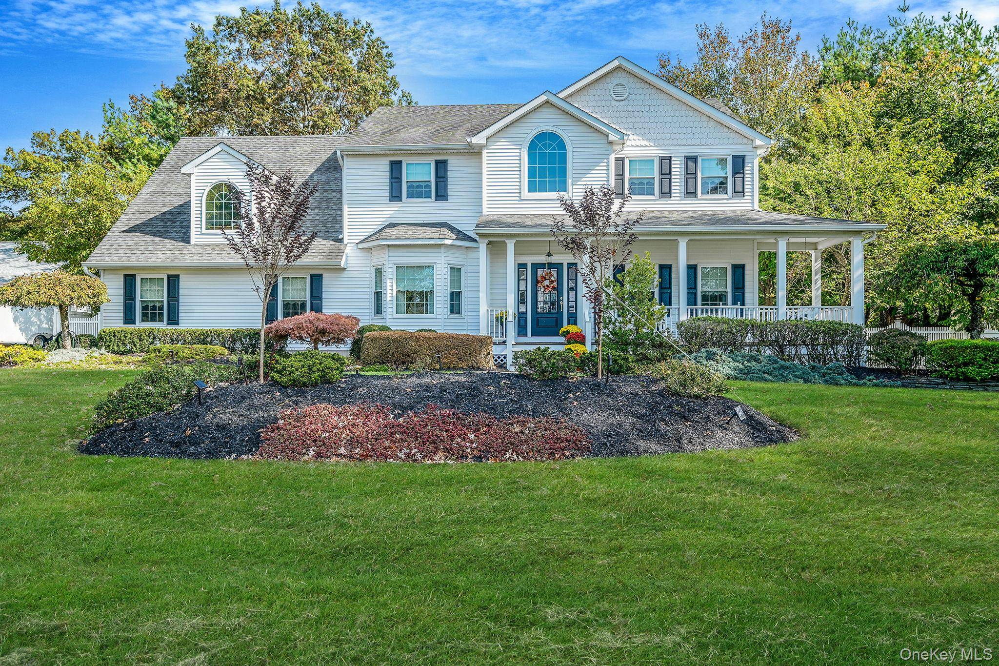 Welcome to 445 Harrison Avenue in Miller Place, where timeless design meets modern comfort.