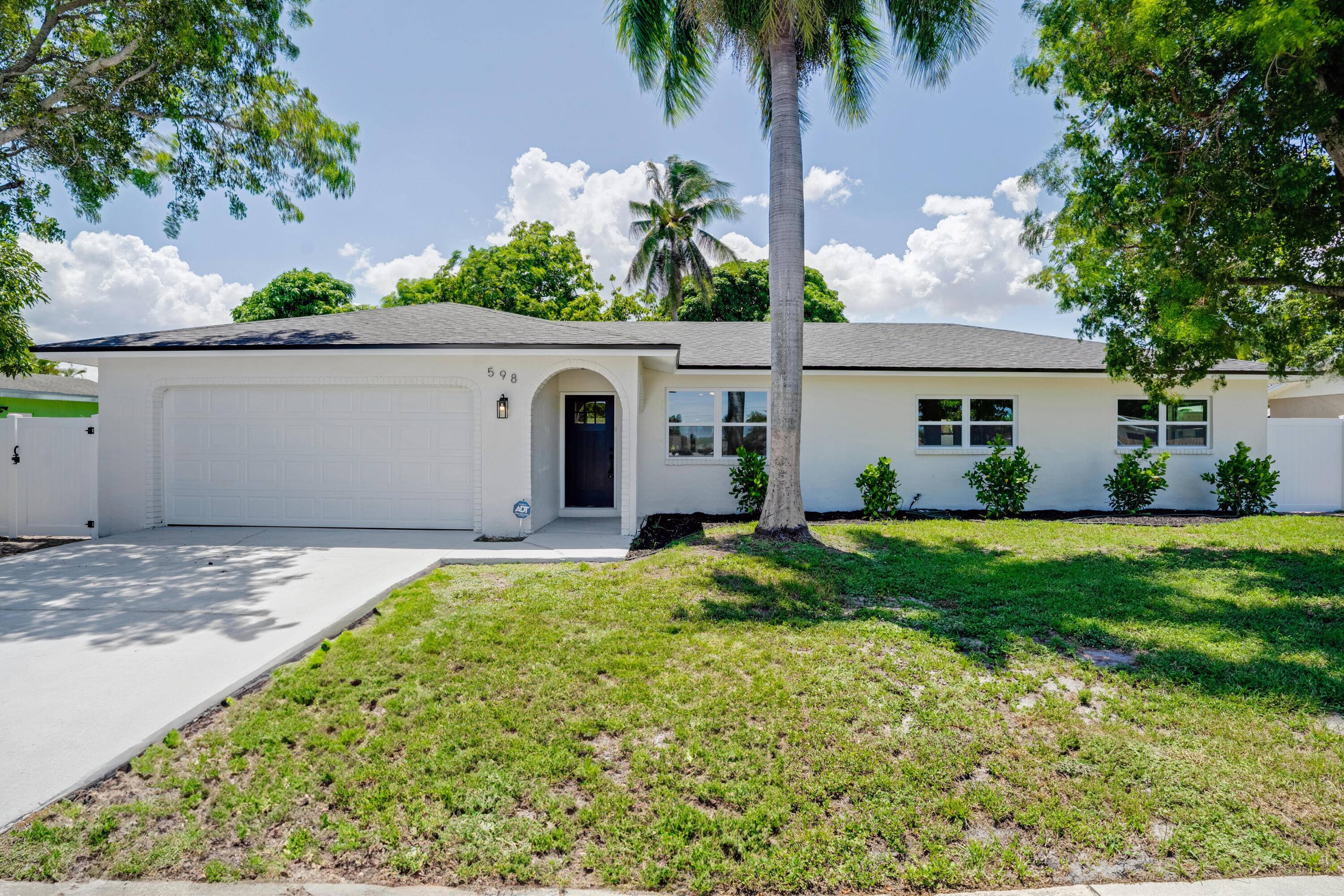 Fully Renovated No HOA Close to I 95 Welcome to 598 Coral Way a beautifully updated 3 bed, 2 bath home minutes from Downtown Delray and the beach.