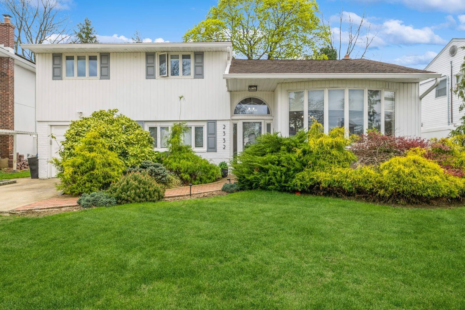 Don't Miss out on this Amazing 3 bedroom 2 Full Bath Cadillac Split with basement and so much more !