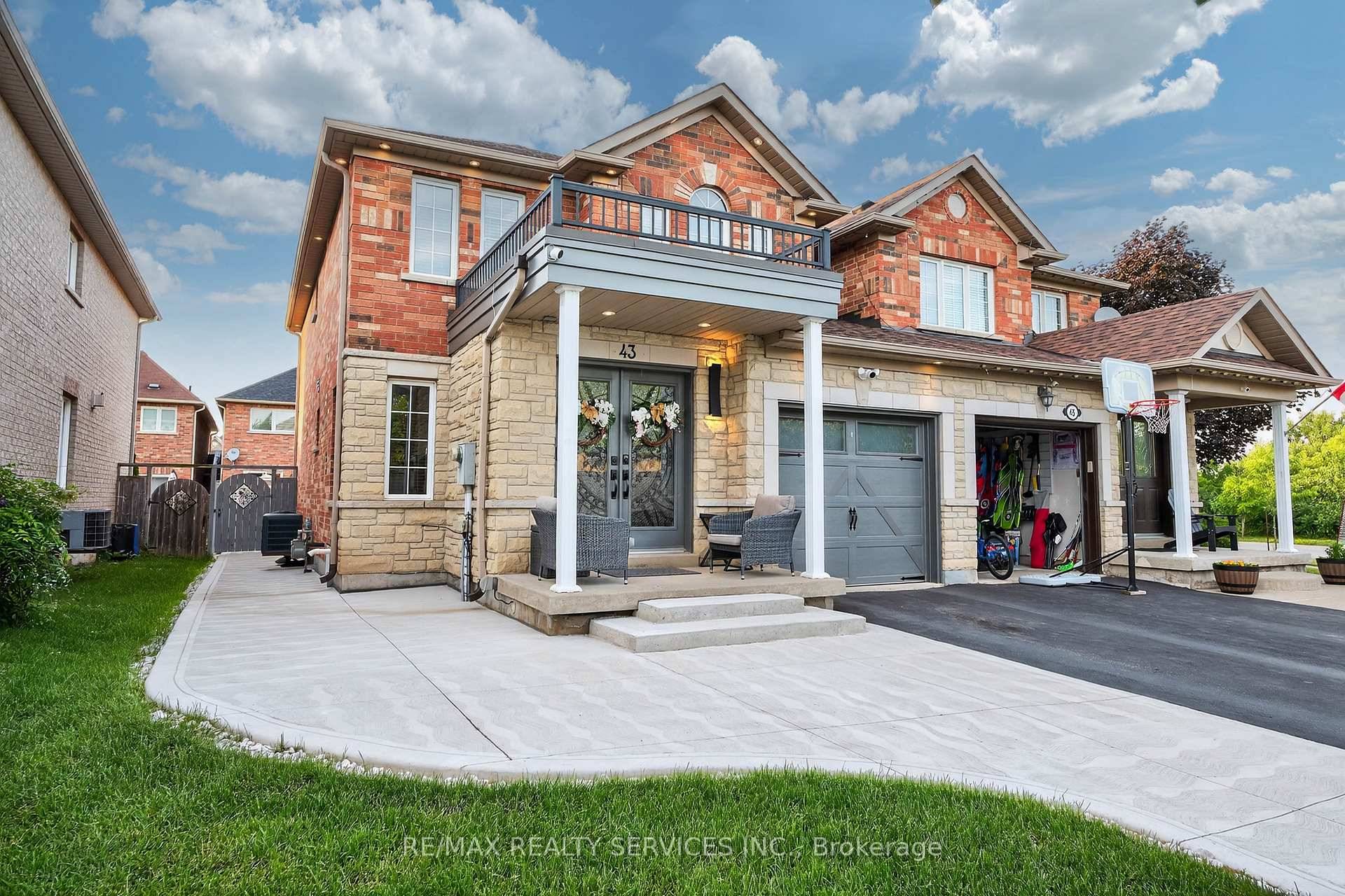 This beautifully upgraded semi detached home, only attached at the garage, offers the feel of a detached in a prime family friendly neighborhood.