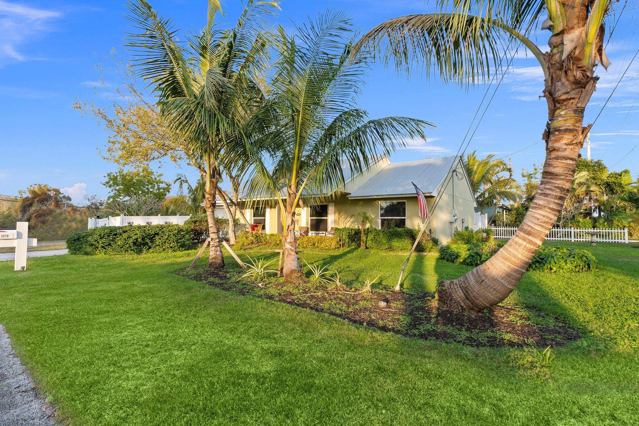 Located just minutes from the beaches and vibrant downtown Jensen, this charming 3 bed, 2 bath home offers coastal living with modern touches.
