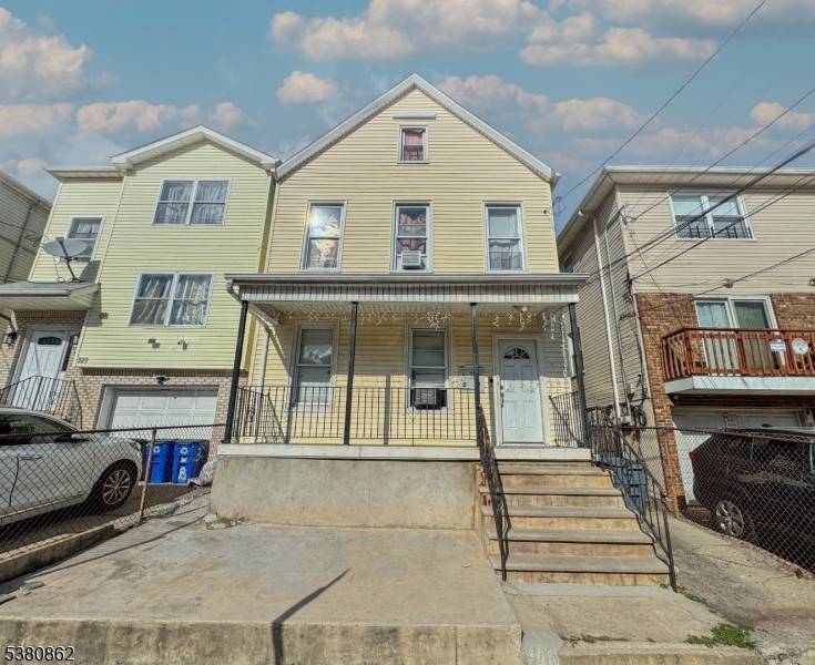 WITH AN ESTIMATED TOTAL PROPERTY SCANNED SQFT OF 2, 630 Basement 667sqft, 1st Unit 752sqft, 2nd Unit 1, 211sqft, THIS COLONIAL STYLE MULTI FAMILY OFFERS TWO UNITS UP DOWN STYLE, ...