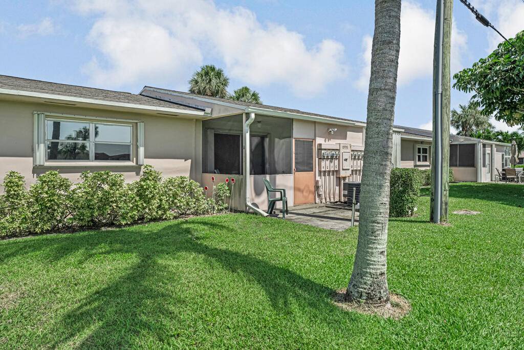Affordable cozy 2 bedroom, 1 bathroom home featuring tile flooring throughout and a open backyard with a peaceful canal view.