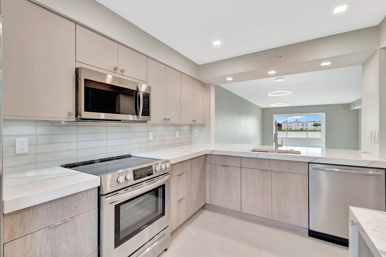 STEP INTO CHIC LUXURY WITH THIS MUST SEE ONE OF A KIND, CONTRACTOR DESIGNED CONDO !
